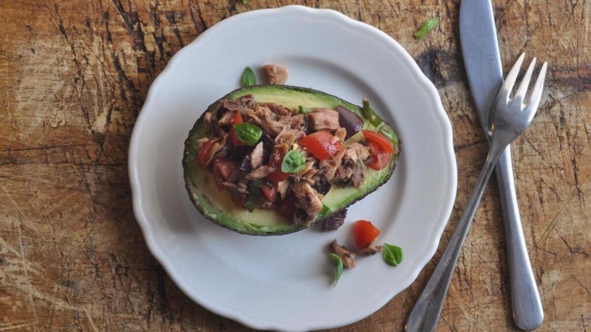 
A riff on a shrimp stuffed avocado, something you see on old school bistros all over France, Avocado stuffed with Mediterranean tuna salad is a prettier version of a tuna sandwich, and one that’s gluten-free.

