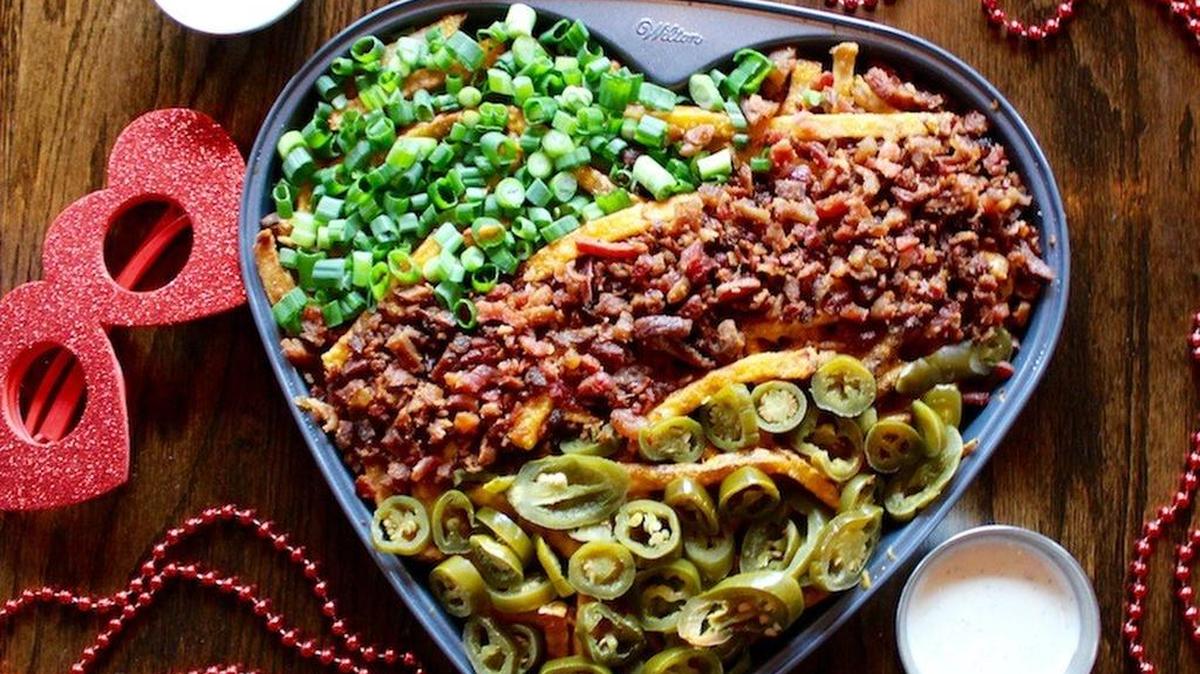A special Valentine’s Day presentatiion of the cheddar fries at Snuffer’s.
