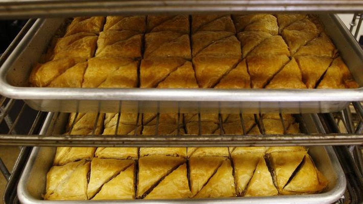 Pans of freshly baked baklava cool for a Fort Worth Greek Festival, returning next week at St. Demetrios Greek Orthodox Church.