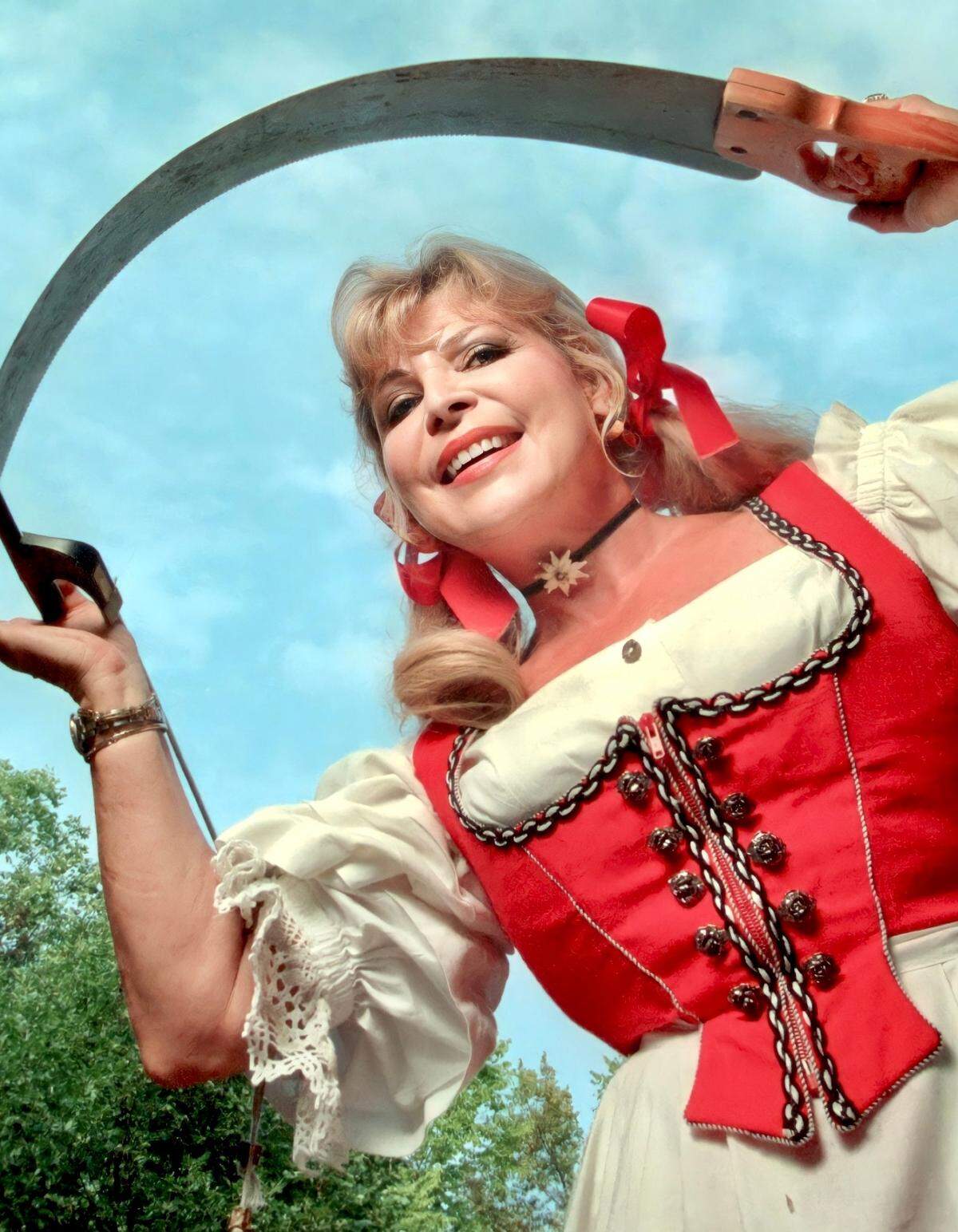 Helga Beckman, seen here in 1998, sang and played the musical saw weekends at Edelweiss German Restaurant.
