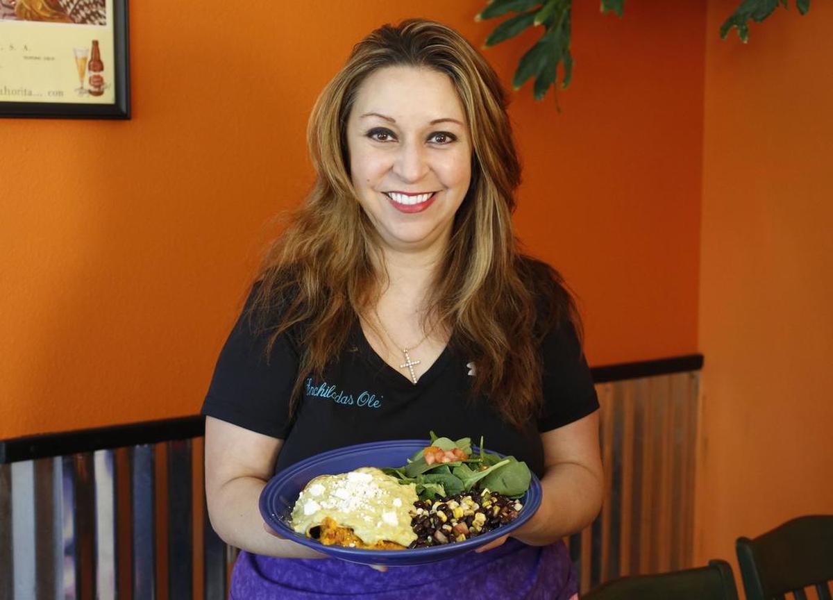 Mary Perez, owner of Enchiladas Ole on North Sylvania Avenue in Fort Worth, with her sweet potato enchiladas