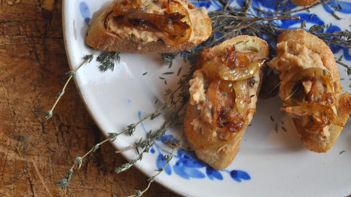 Toast to each other with cannellini bean puree with caramelized onion toasts – sweet and slightly spicy.