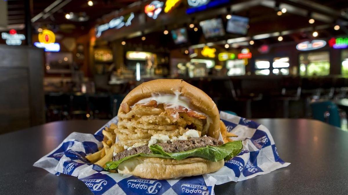 Pappas Burger’s blue cheese burger with onion rings, bacon and Worcestershire was featured in DFW.com.