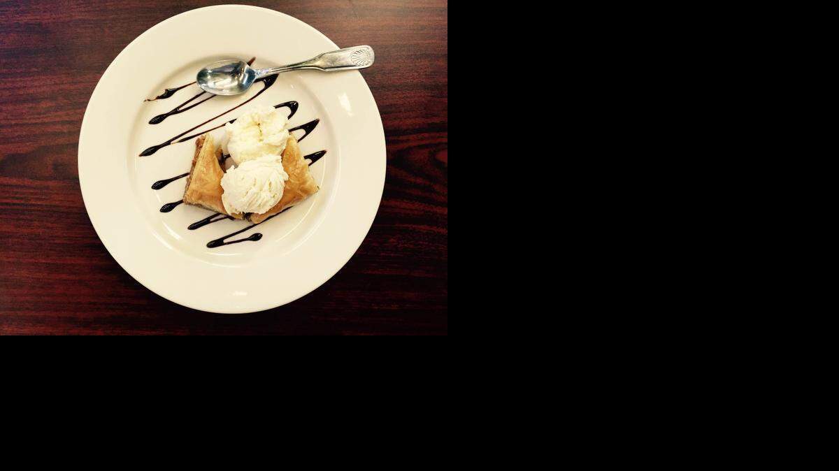 
Olives Mediterranean Grill dresses bakery baklava with ice cream and chocolate.
