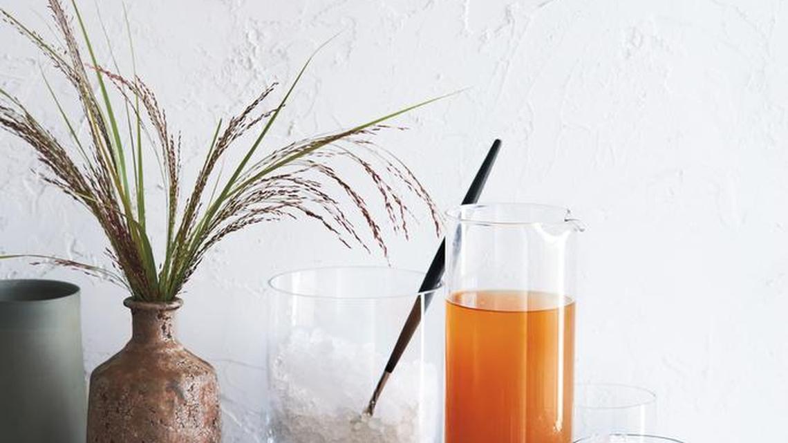 A pitcher of drinks means the host doesn’t have to be the bartender, too; orange marmalade and lime juice flavor these whiskey sours.