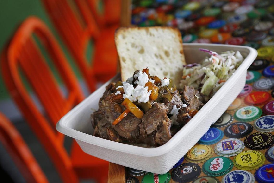 A honey-rosemary flank steak with caramelized onions, roasted peppers and goat cheese at Lettuce Cook.