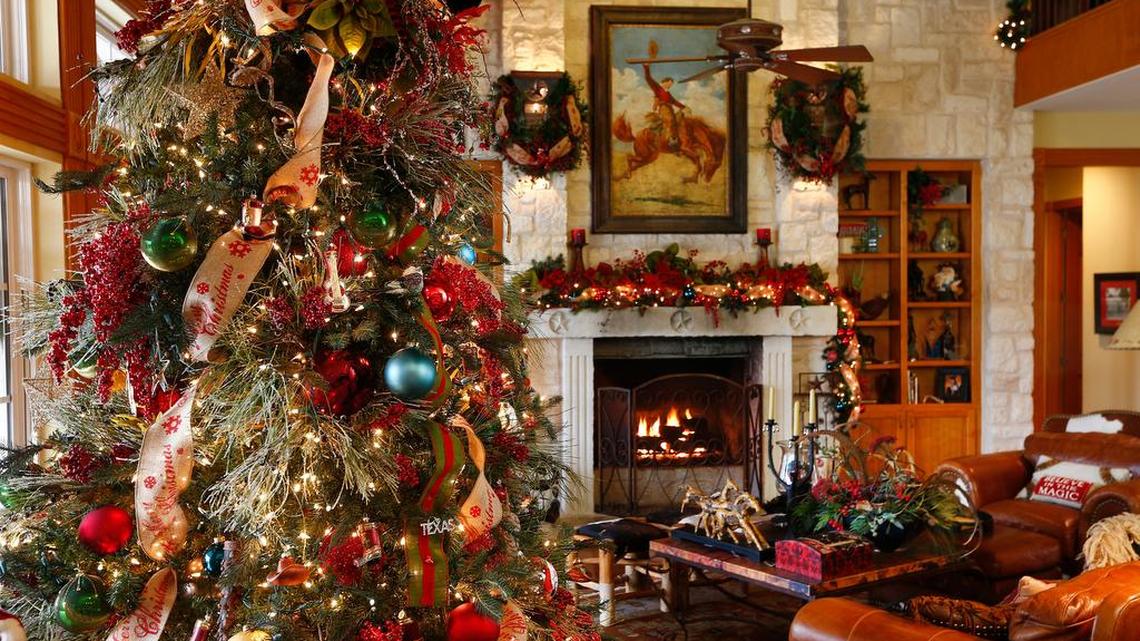 The largest tree in the Galloways’ rustic home is always displayed in the living room, which shimmers with bright holiday dressings.