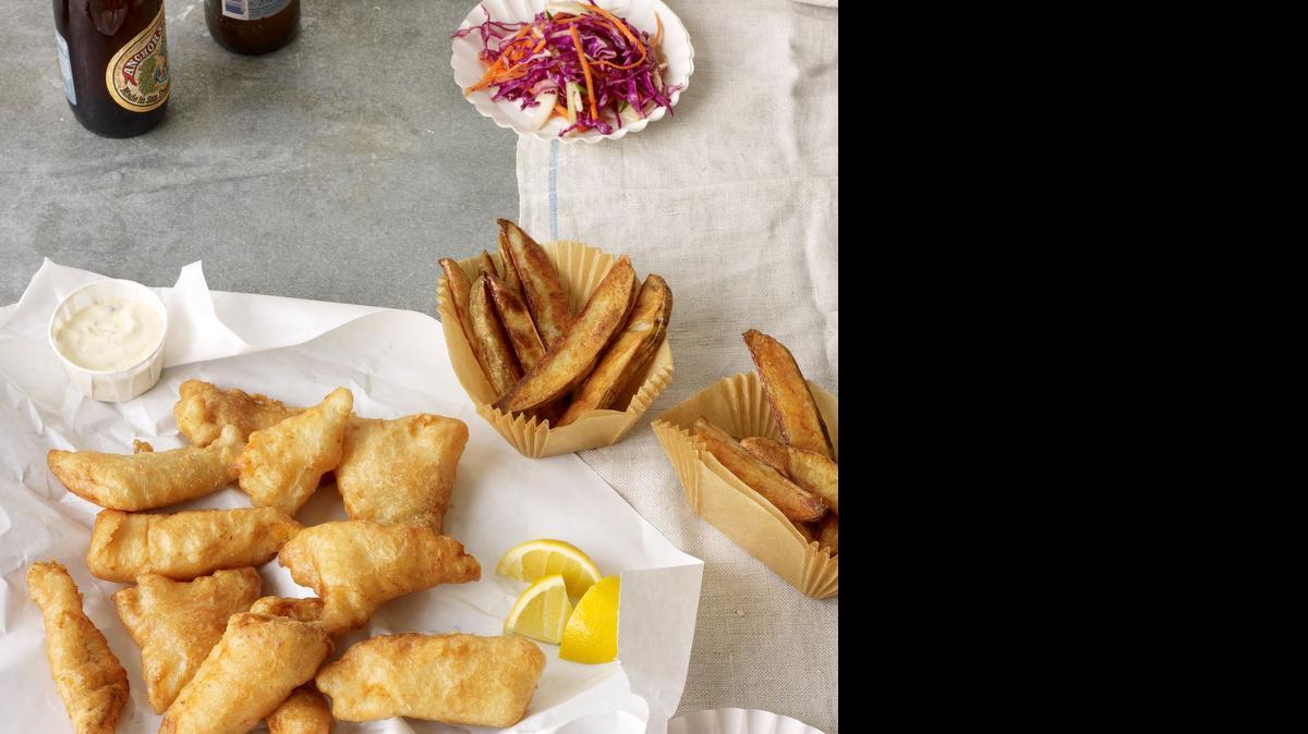 
Beer-battered fish with oven fries: Here’s a tip for deep-frying: If you don’t have a thermometer, drop a little batter into the oil to see if it’s ready. The batter should start to bubble and rise to the top on contact.


