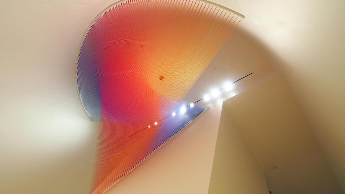 Plexus no. 27 splayed its rainbow of colors across the minimalist white walls and ceiling of the Crystal Bridges Museum in Arkansas.