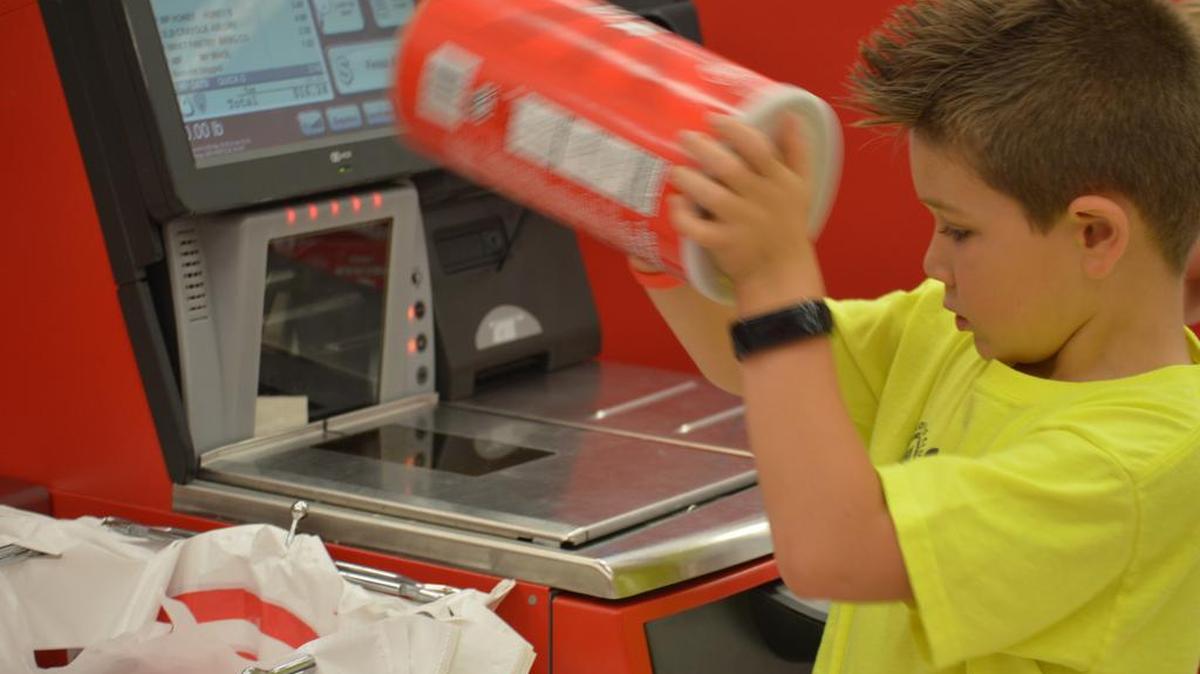 Cooking School at the Primrose School of Keller is more than learning to cook. After planning a menu and making a budget, Jackson and his group go shopping, and yes, learn how to use the self check out.