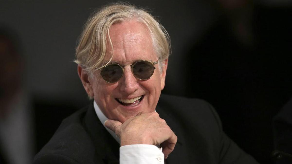 Musician T-Bone Burnett listens to questions during a press conference for Inside Llewyn Davis at the 66th international film festival, in Cannes, southern France, in May 2013.