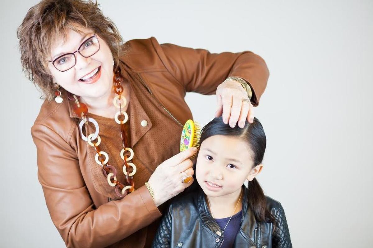 Susan Huston and a young student from her workshop.