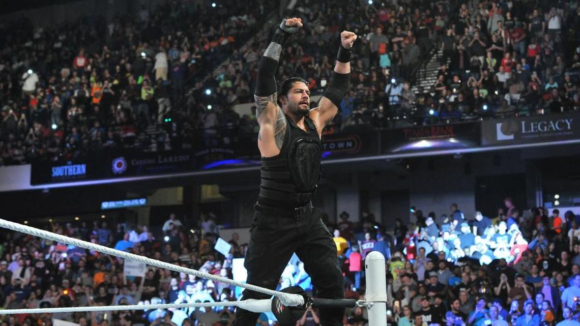 Roman Reigns (on ropes) will be in the featured event at Wrestlemania 32