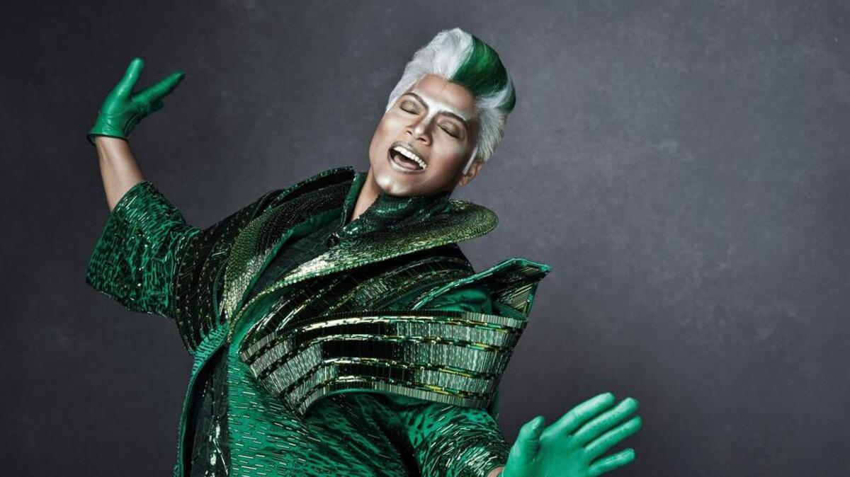 Queen Latifah as the Wizard of Oz
