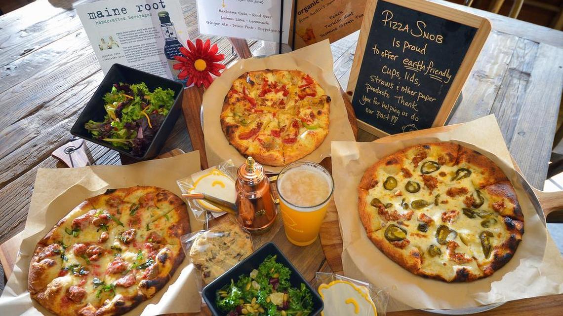 Meatball Parmigiana, tomato-veggie, and sausage-jalapeño pies at Pizza Snob in Fort Worth, Food Network's pick for best pizza in the city.