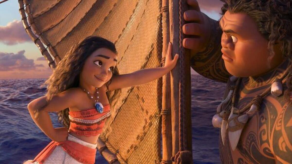 Moana, voiced by Auli’i Cravalho, and Maui, voiced by Dwayne Johnson, in a scene from Moana