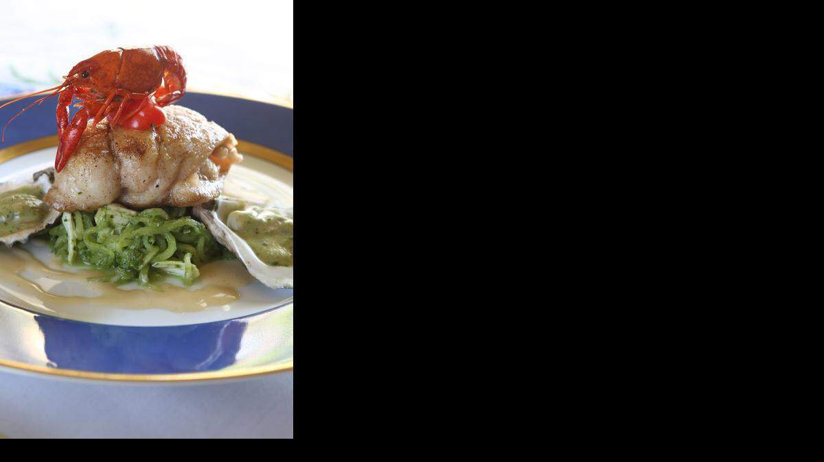 
Chef Louise Lamensdorf prepared sautéed drum with crab and oyster sauce, story tagline: Elevated “bayou food,” pegged to Mardi Gras, Thursday, January 15, 2015. Star-Telegram/Paul Moseley.

