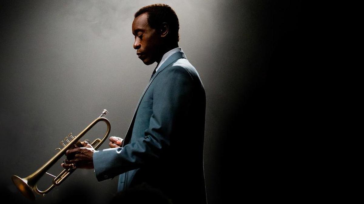 Don Cheadle as Miles Davis.