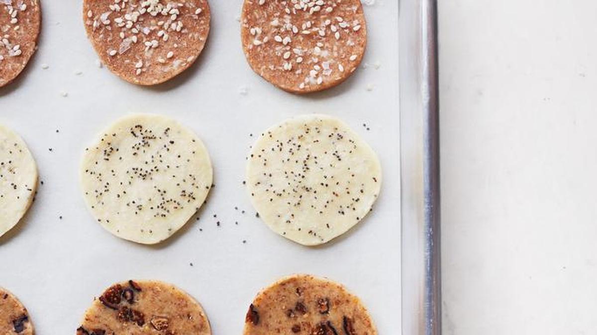 Whole wheat and sesame crackers are sweet and salty and work beautifully with creamy cheeses like Brie as well as aged cheeses like Gouda and manchego; Cheddar and Gruyère don’t even need a topping but are especially nice with a little pepper jelly or quince paste; fig and almond crackers are good with soft, mild ricotta and pungent blue cheeses.