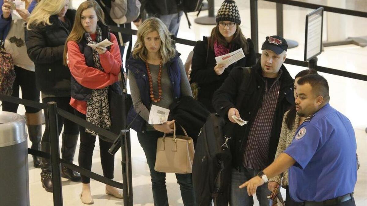 For many families who come from afar, Thanksgiving means waiting in long lines.