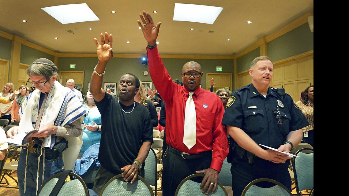 
Worshippers at the Tarrant County National Day of Prayer on Thursday at St. Andrew's Episcopal Church in Fort Worth. The annual event was moved from Burnett Park because of the chance of rain. 

