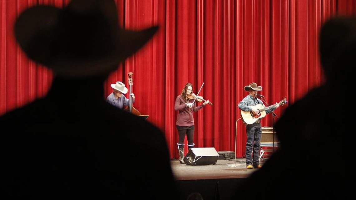 Bunk Skelton, with Russ Rand on bass and Brook Wallace Deaton on fiddle, provide the music during the Jan. 15 cowboy church service at the Fort Worth Stock Show.