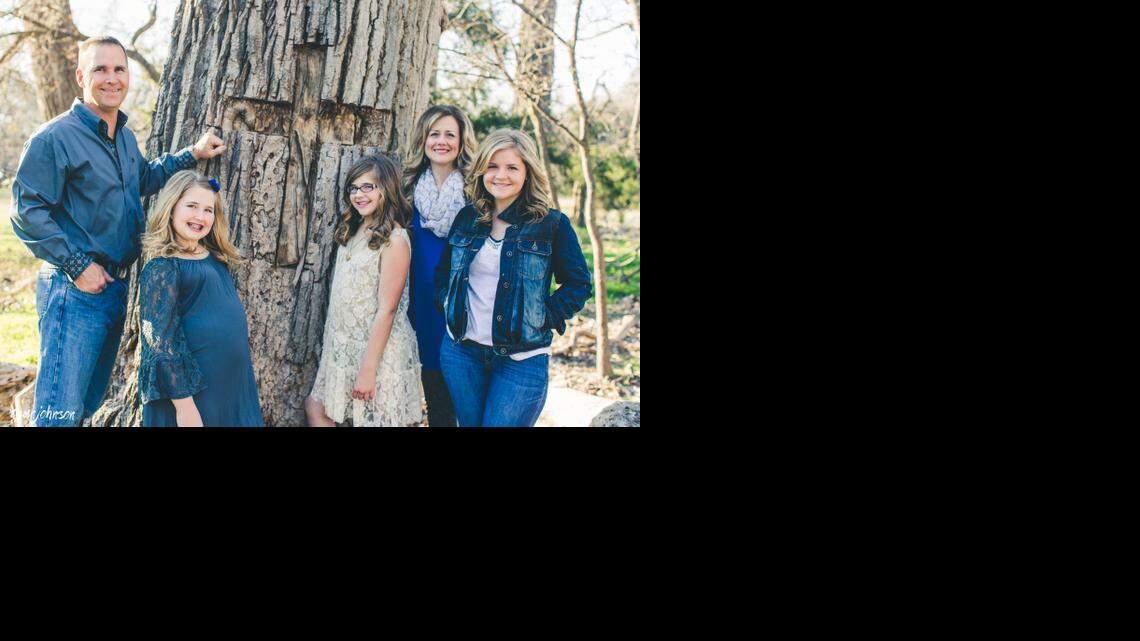 
Beam family photo by the tree, from Kevin, Adelynn, Annabel, Christy and Abbie. 
