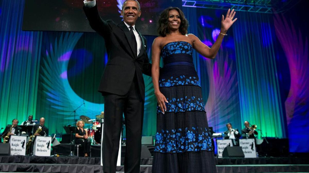 In this Sept. 19, 2015 file photo, President Barack Obama and first lady Michelle Obama arrive at the Congressional Black Caucus Foundations 45th Annual Legislative Conference Phoenix Awards Dinner at the Walter E. Washington Convention Center in Washington. The president and first lady will make an appearance at the South by Southwest interactive and music festivals in Austin, Texas. The appearances mark the first time a sitting president and first lady have spoken at the annual gathering, a group of conferences on tech, music and film which drew more than 80,000 attendees in 2015.