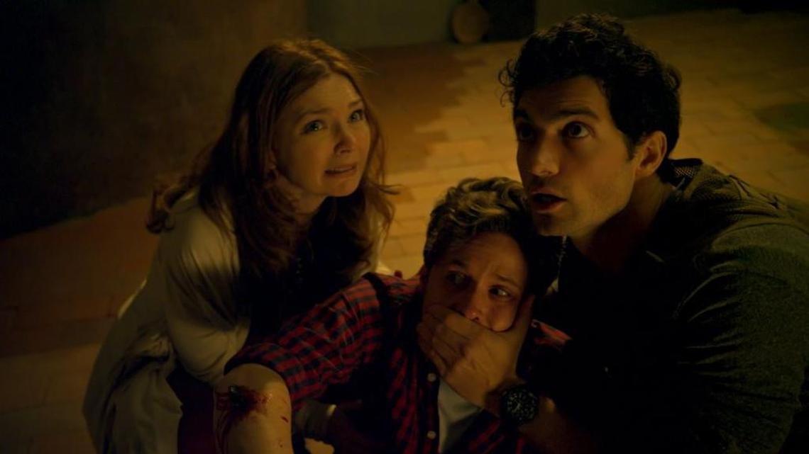 Brigid Brannagh, Kris Lemche and David Alpay in ‘They’re Watching’