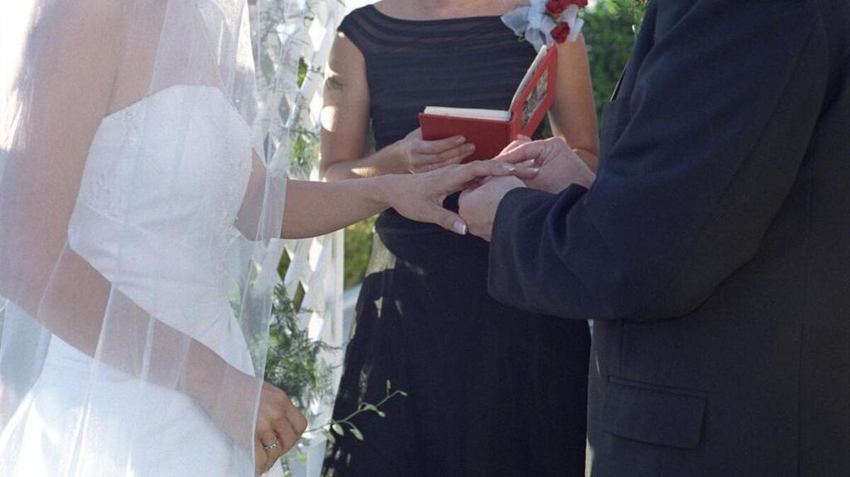 White may be traditional for the wedding, but the bride may wear whatever color she wishes for rehearsal activities including the dinner, Miss Manners says.