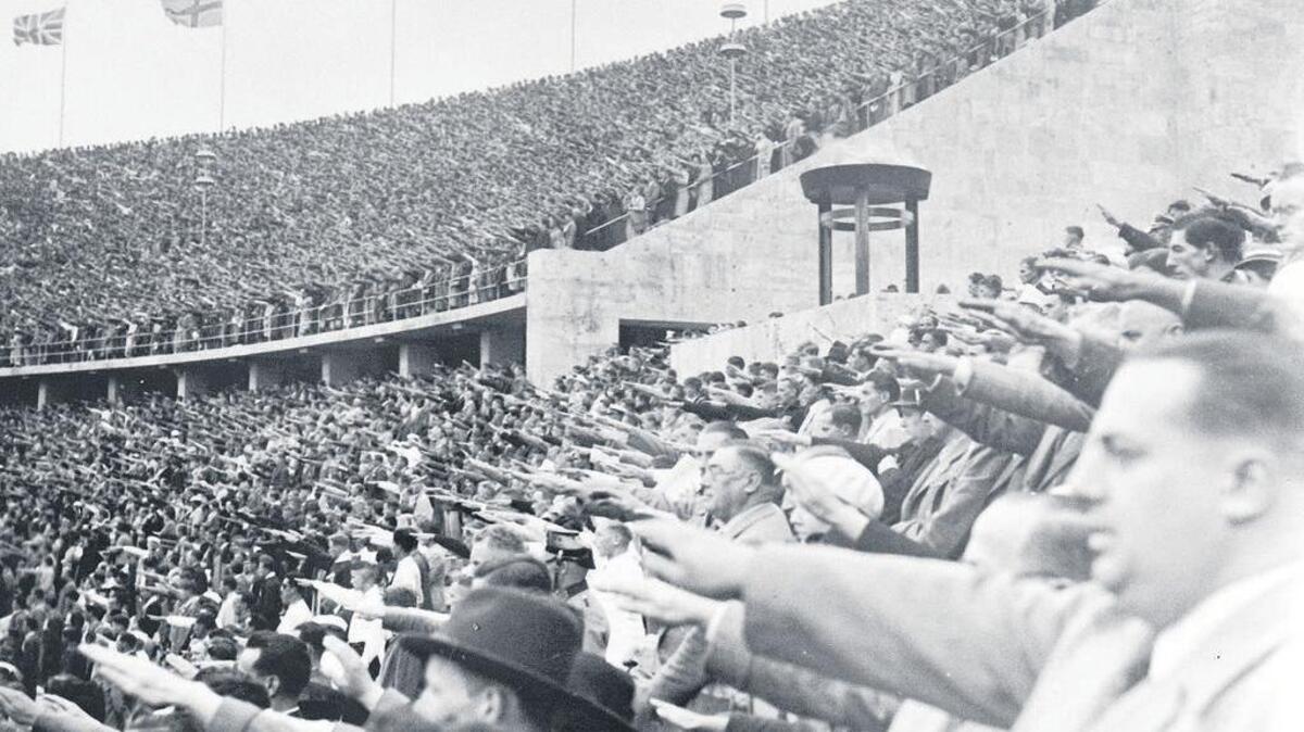 
German citizens saluting Adolf Hitler at the opening of the 11th Olympiad in Berlin.

