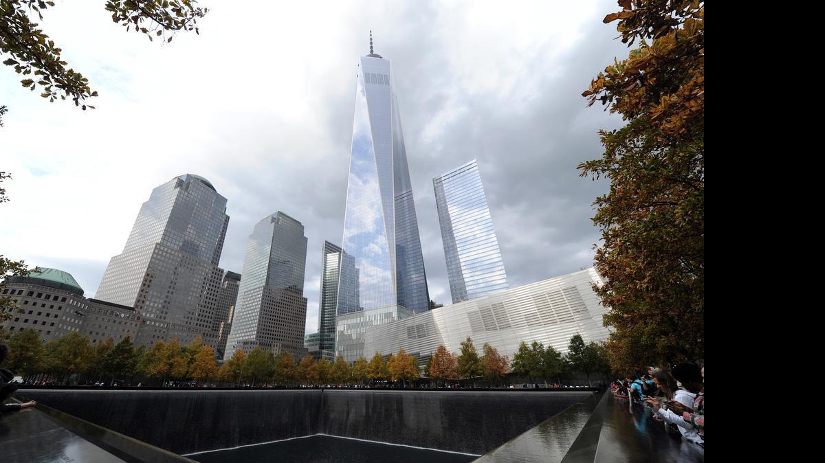 
One Word Trade Center soars above the grounds of the memorial in lower Manhattan.

