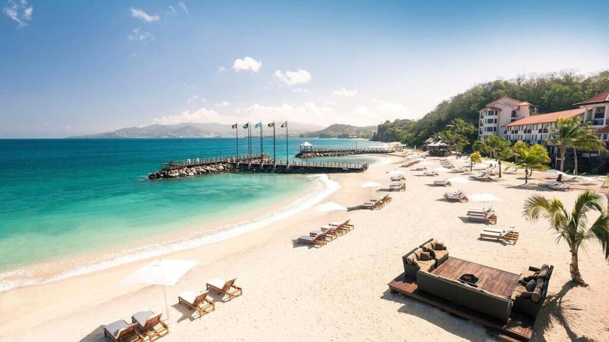 Three themed villages on Sandals LaSource Grenada’s 17-acre property access the scenic Pink Gin Beach — named for its rose-tinged sand.