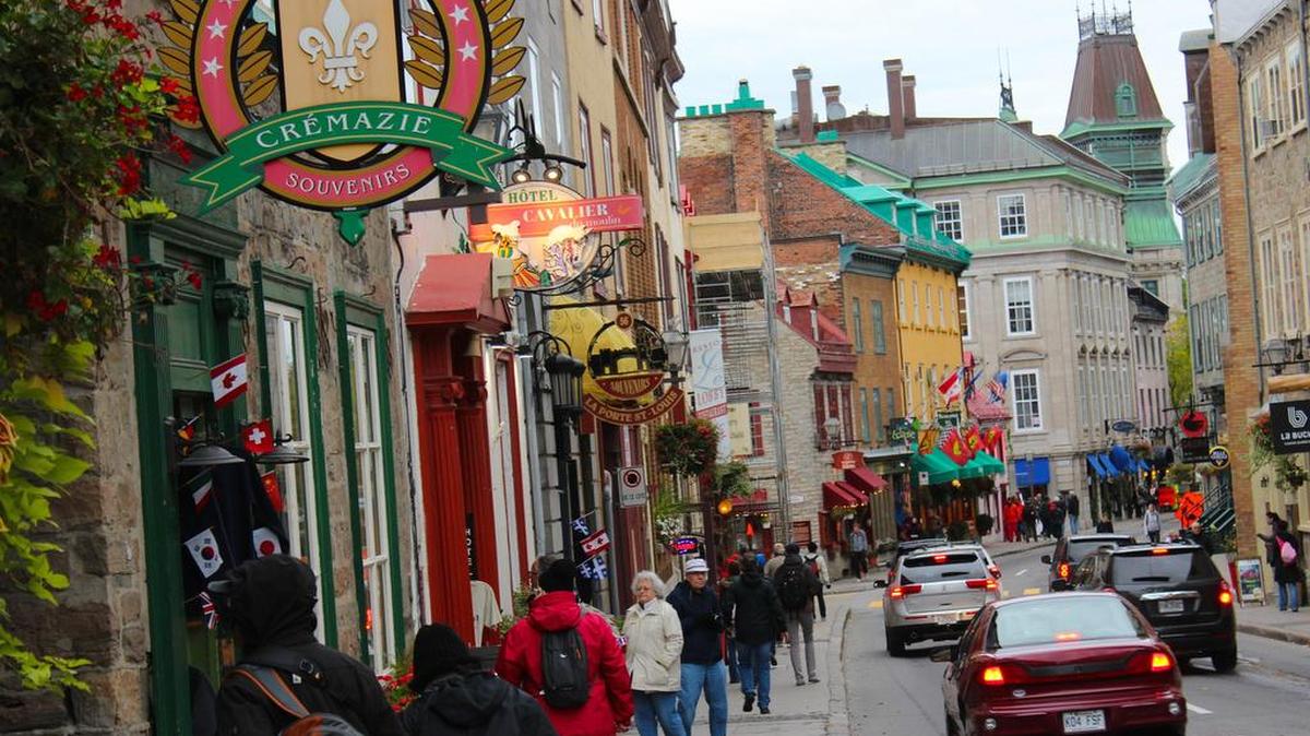 In the Upper Town of Quebec City, fall visitors enjoy the brisk days.