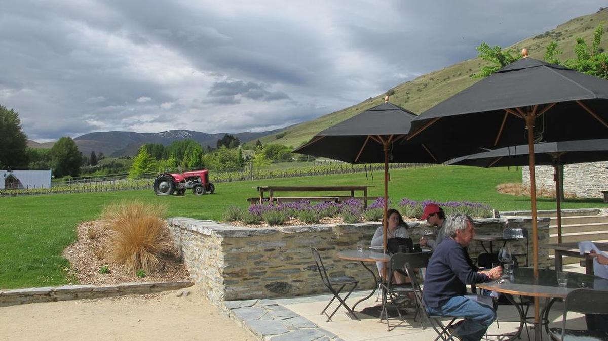 At Amisfield Winery and Bistro, between Wanaka and Queenstown, the relaxed outdoor dining space offers exquisite mountain views.