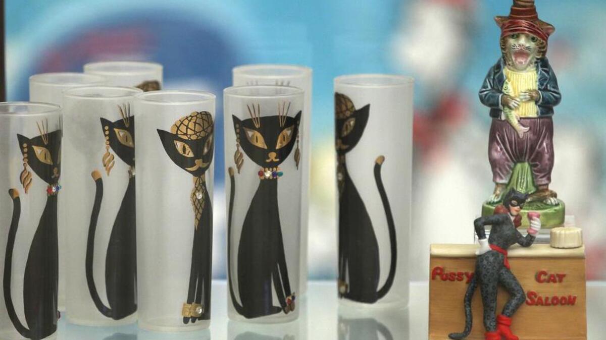 Cat inspired barware and decanters at the Feline Historical Museum.