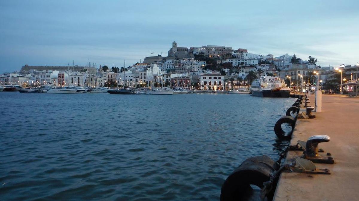 Ibiza Town’s Old City, including the hilltop Dalt Vila, at dusk.