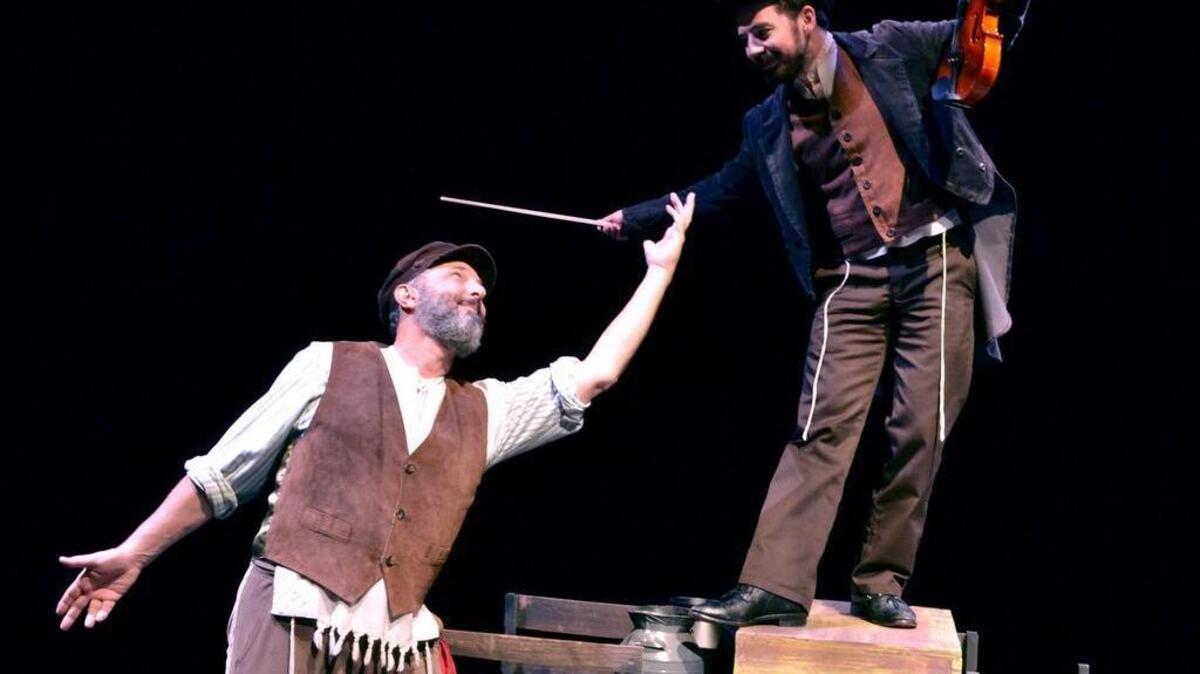 
Bruce Winant is Tevye and Matt Beutner is Fiddler in ‘Fiddler on the Roof’ at Casa Manana
