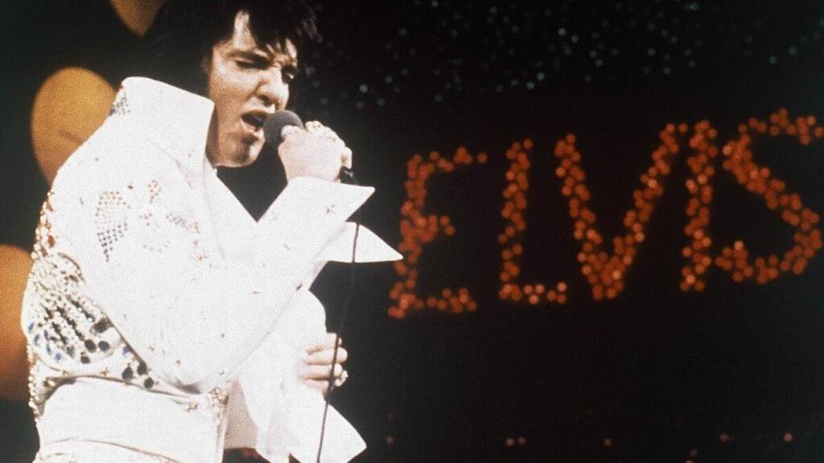 Elvis in 1972, during the bedazzled jumpsuit era