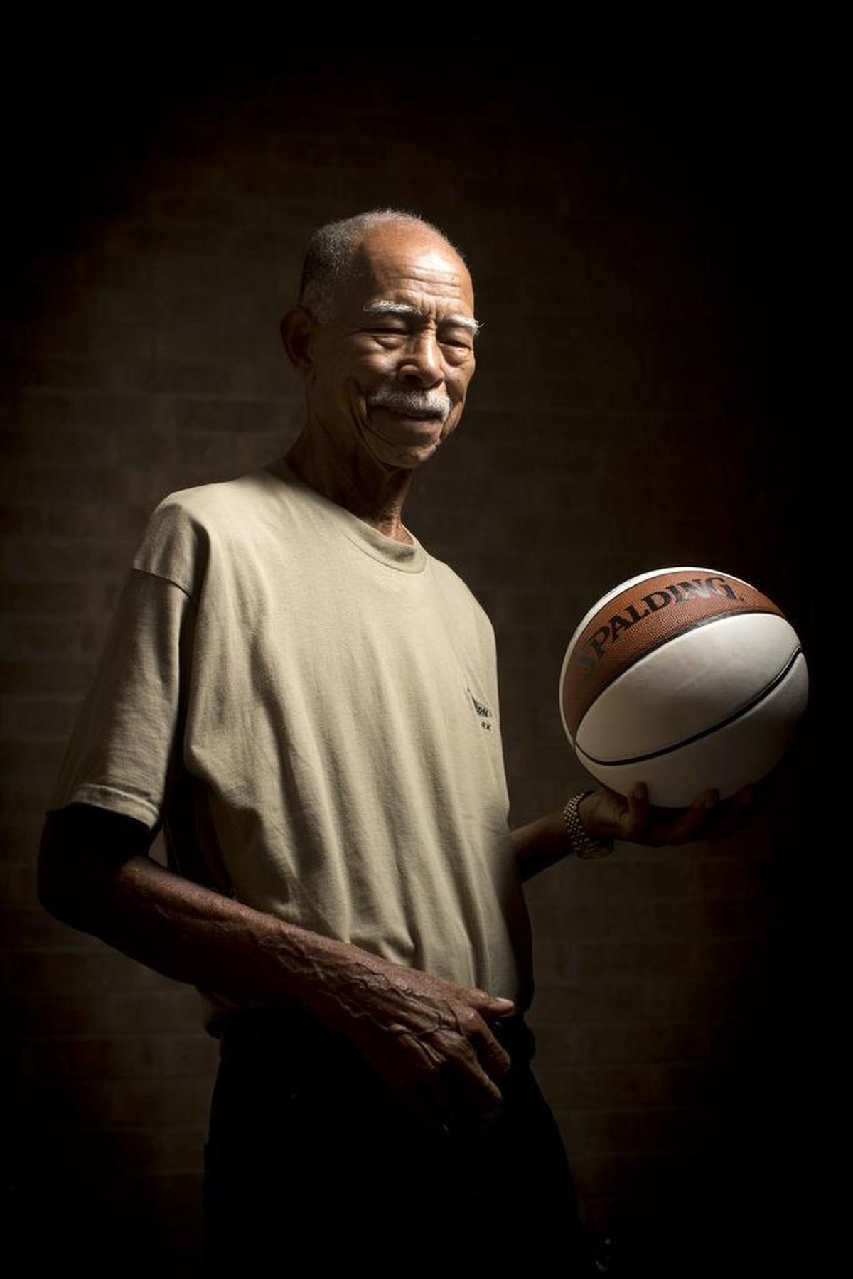 Dunbar High School coaching legend Robert Hughes will be enshrined in the national Naismith Memorial Basketball Hall of Fame on Sept. 8.