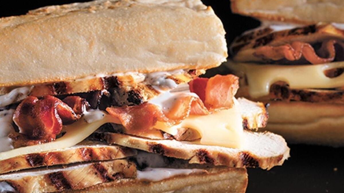 The ‘Q’ sandwich at Newk’s Eatery features flame-grilled chicken, bacon, Ammerländer Swiss cheese and Newk’s white BBQ sauce.