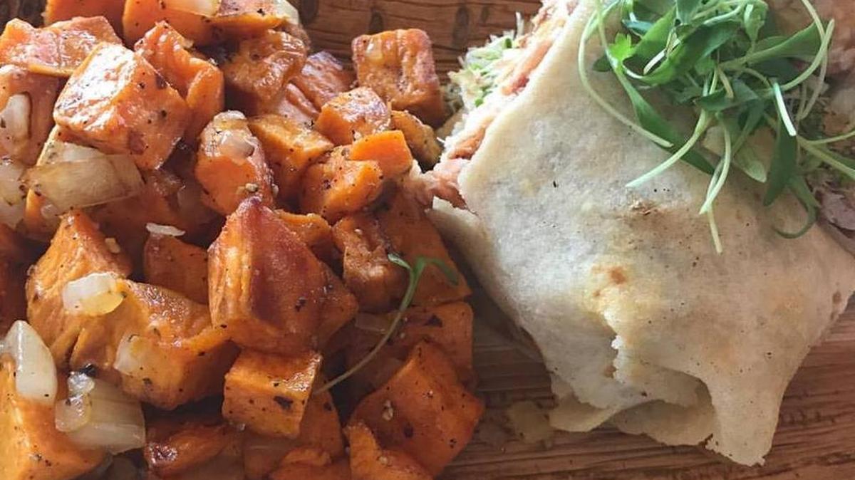 Roasted sweet potatoes and a Turkey Lurkey wrap (smoked turkey, sprouts, sharp cheddar, apple, bacon jam) at Protein Fit Kitchen in Southlake
