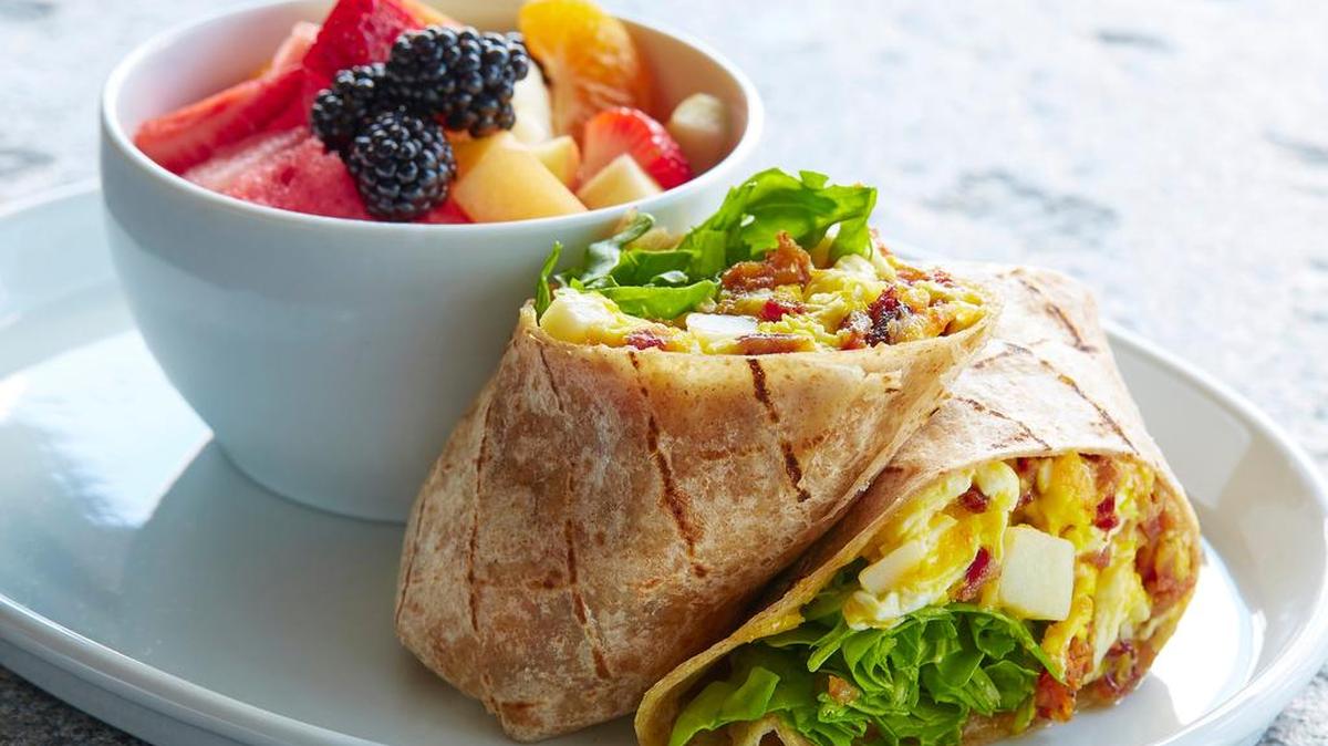 The Dagwood wrap (pepper bacon, egg, potato, arugula, shaved cheddar; also available in a “greens” bowl version) at Unleavened Fresh Kitchen, which is aiming for a late-2017 opening in Southlake.