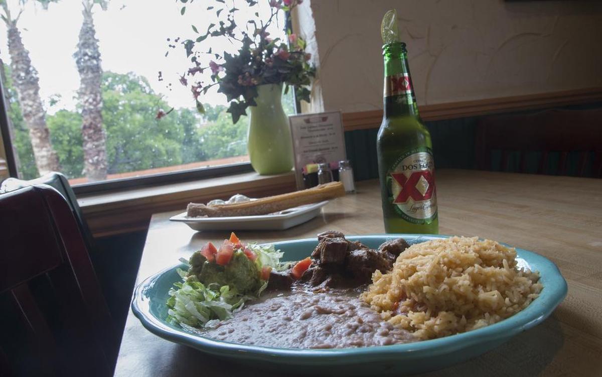Carne guisada with churros for dessert at Tia’s on the Bluff in Fort Worth.