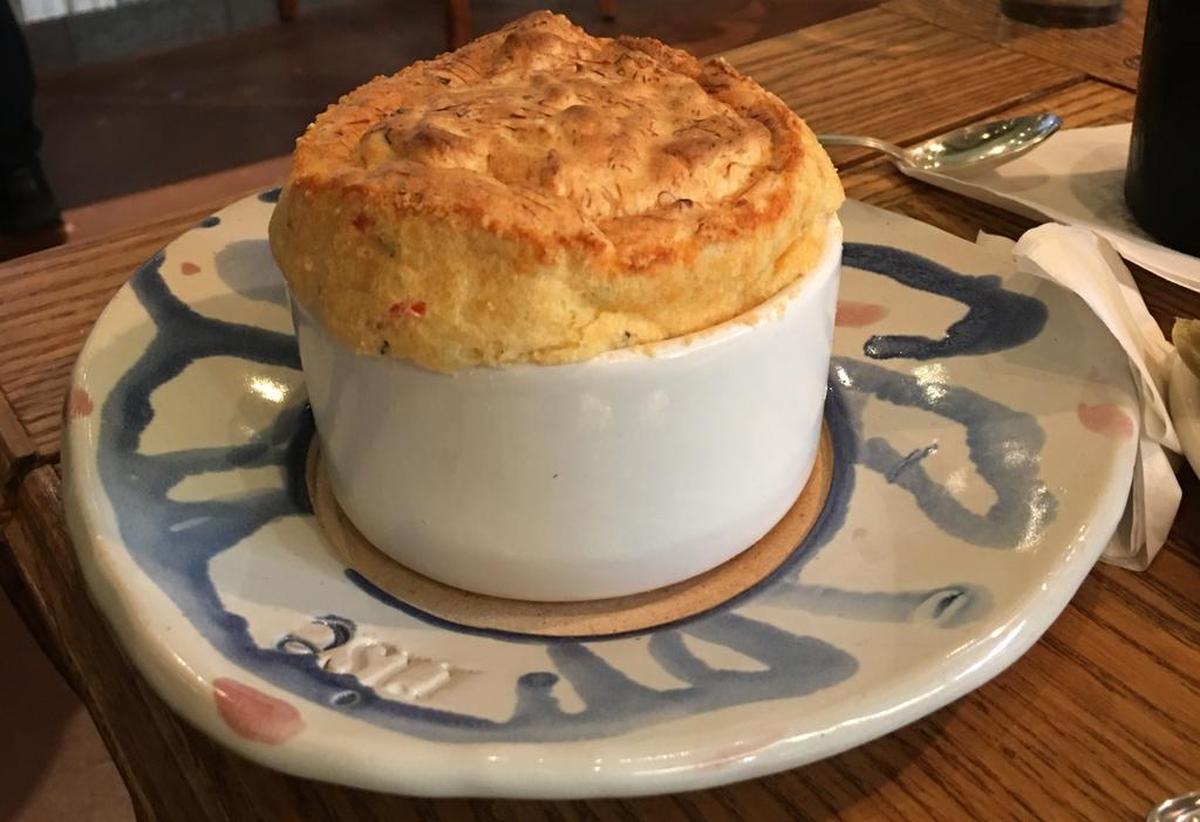 Crabmeat souffle, one of the savory souffles at Rise in Fort Worth, which also offers sweet souffles and several non-souffle items.