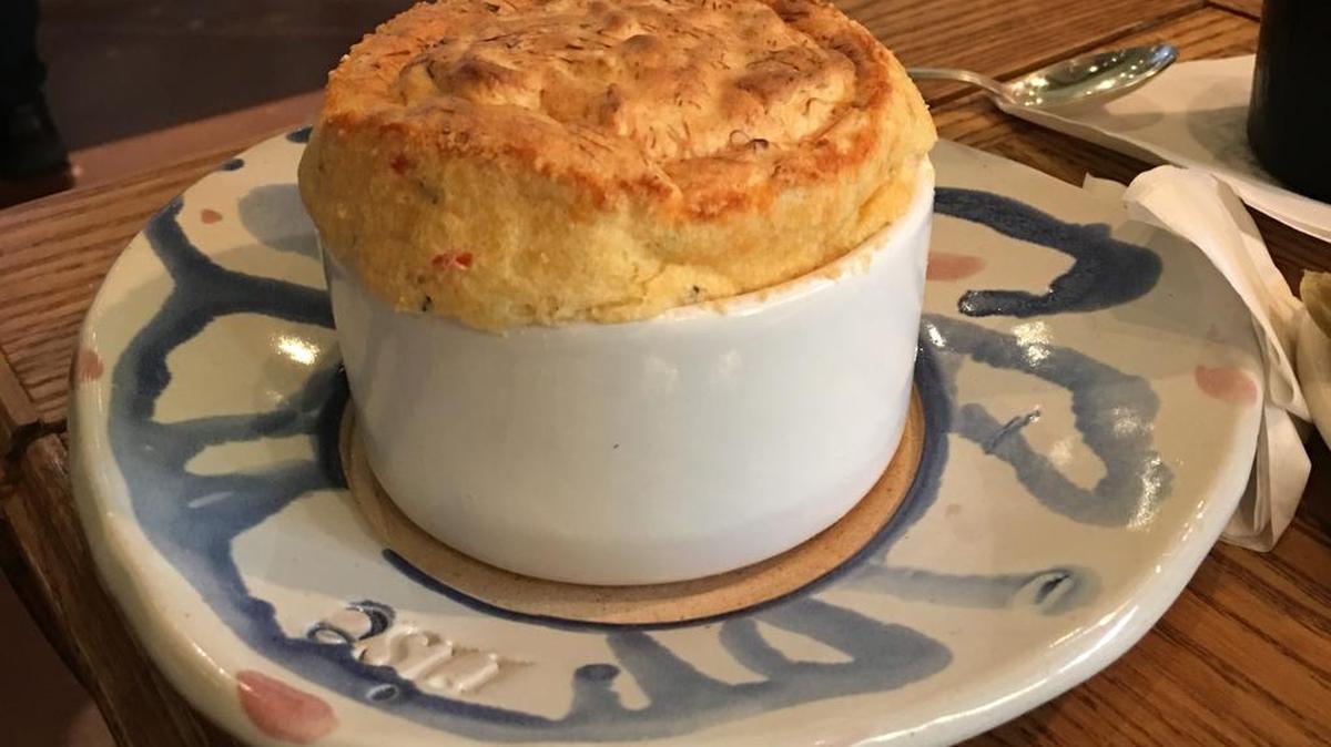 Crabmeat souffle, one of the savory souffles at Rise in Fort Worth, which also offers sweet souffles and several non-souffle items.