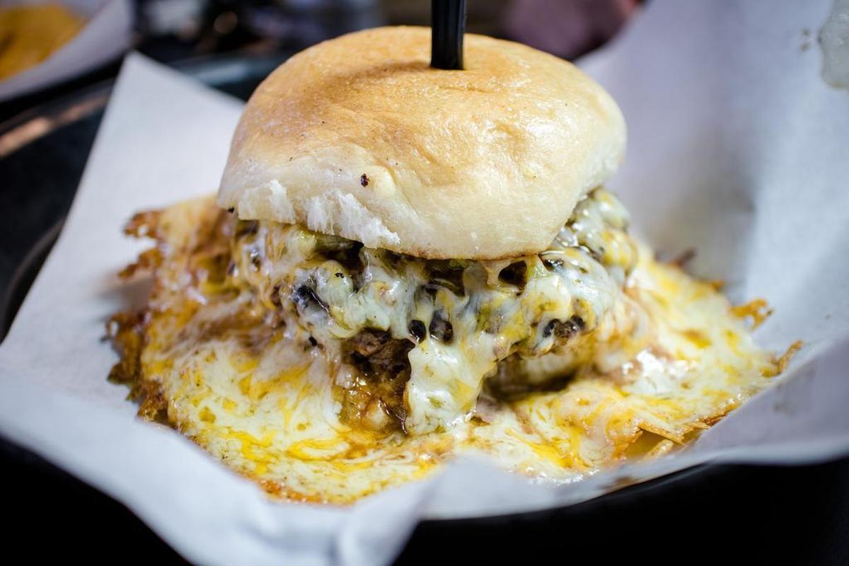 Gravity got to the fried-cheese ring on Fuego Burger’s namesake burger, but we just folded up the cheese ring and put it on the patty.