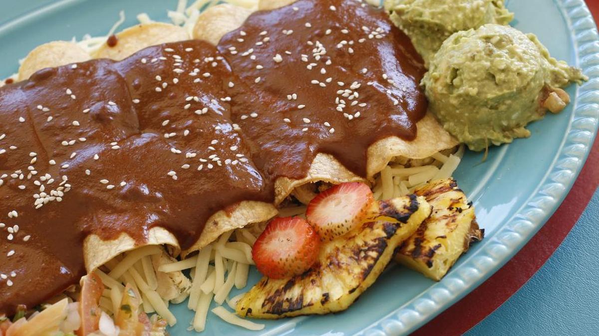 Chicken enmoladas (enchiladas in mole) at Enchiladas Olé.