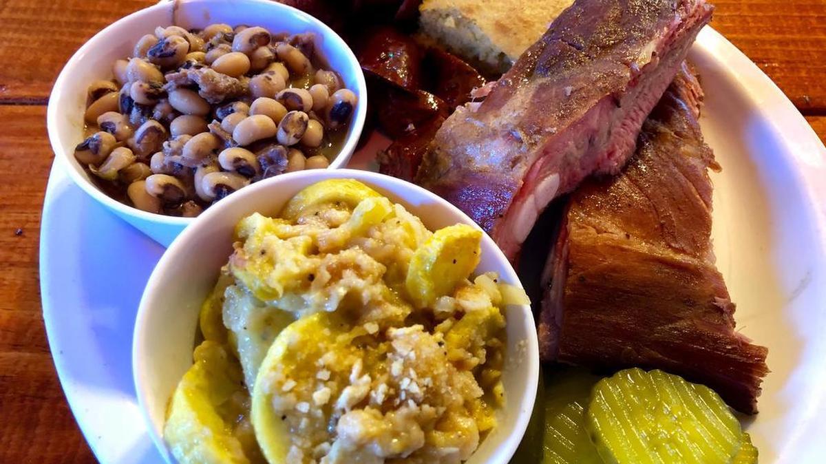 Pork ribs, sausage, squash casserole and black-eyed peas at Lady & the Pit.