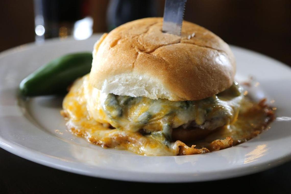 Fuego Burger gets its name from its namesake burger, a green-chile cheeseburger with a fried-cheese ring orbiting it.